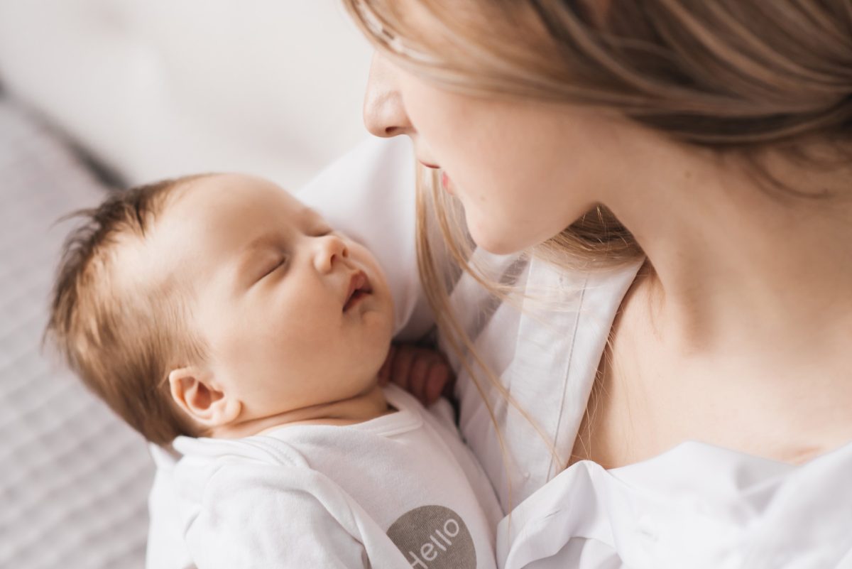 mom holding infant